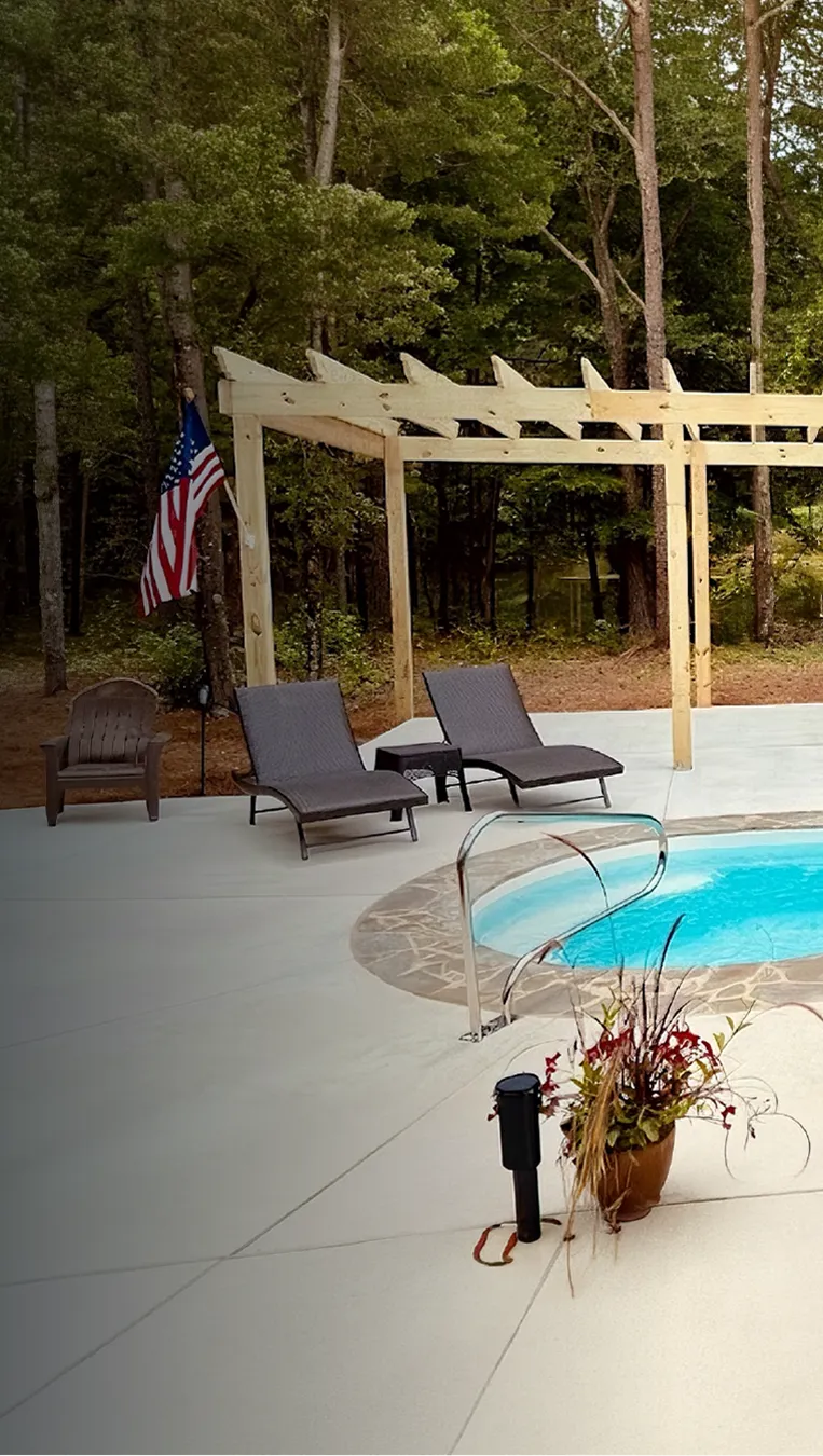 Granita Fiber pool in a backyard with pergola and waterfall — private label pools